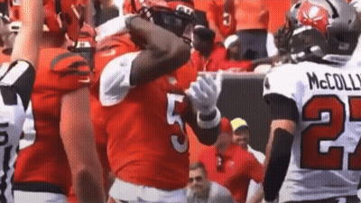 Football Player Number 5 Tackled By Number 27 GIF