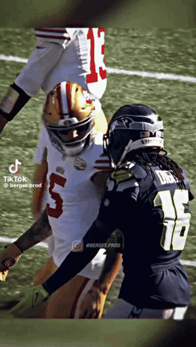 Football Player Number 5 Tackled GIF
