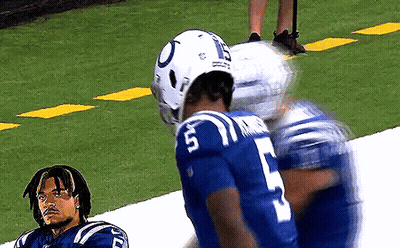 Football Player Number 5 Talking To Another Player GIF