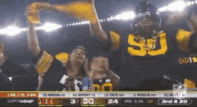 Football Player Number 50 In Front Of Crowd GIF
