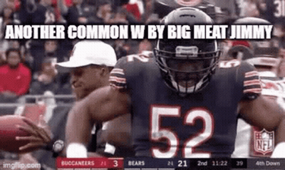 Football Player Number 52 Holding Football GIF