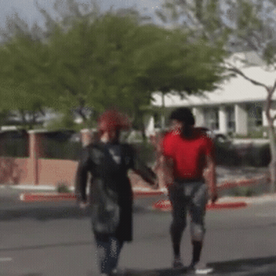 Football Player Number 52 Tackled By NFL Mascot GIF