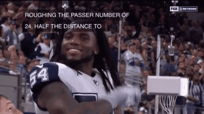 Football Player Number 54 Smiling In Front Of Crowd GIF