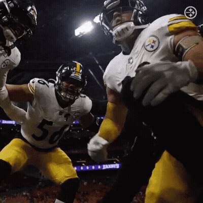 Football Player Number 56 Being Tackled GIF