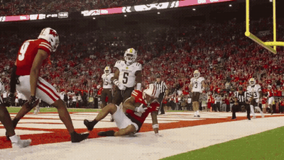 Football Player Number 6 Being Tackled GIF