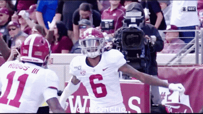 Football Player Number 6 Next To Another Player GIF