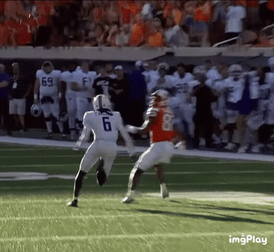 Football Player Number 6 Running Toward Player Number 8 GIF
