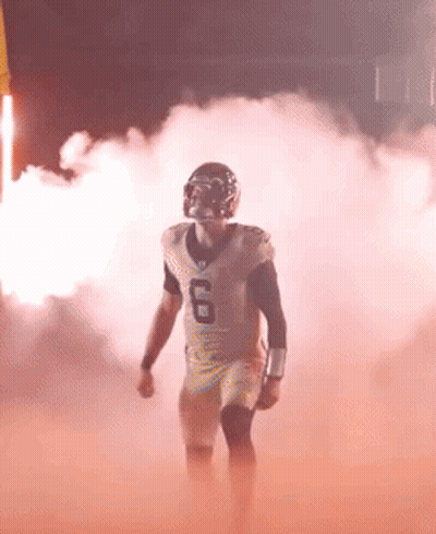 Football Player Number 6 Walking Through Smoke GIF