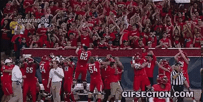 Football Player Number 62 In Front Of Crowd GIF