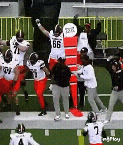Football Player Number 66 On Field GIF