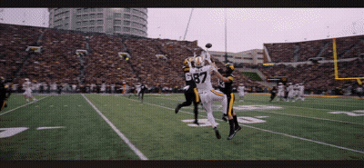 Football Player Number 67 Catching Pass GIF