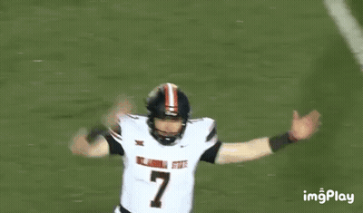 Football Player Number 7 Arms Outstretched GIF