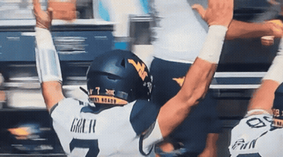 Football Player Number 7 Being Tackled GIF