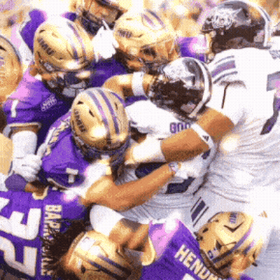 Football Player Number 7 Being Tackled GIF