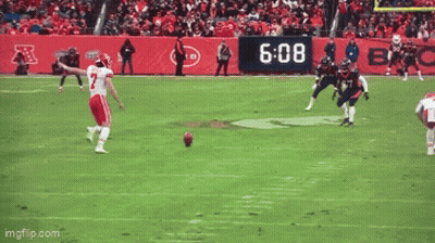 Football Player Number 7 Laying On Ground GIF