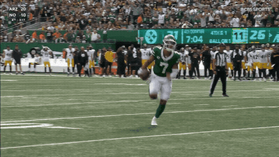 Football Player Number 7 Running On Field GIF