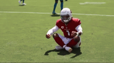 Football Player Number 7 Sitting On Grass GIF
