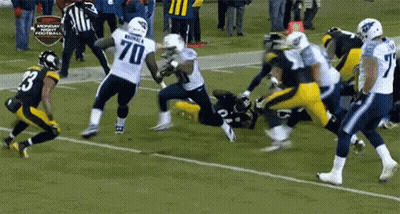 Football Player Number 70 Being Tackled GIF