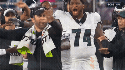 Football Player Number 74 In Front Of Crowd GIF