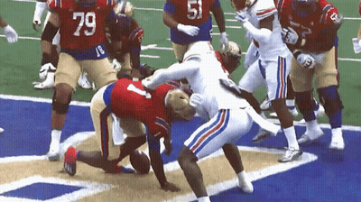 Football Player Number 79 Being Tackled GIF