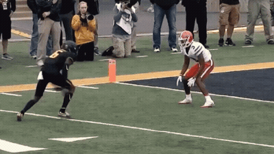 Football Player Number 8 Running At Another GIF