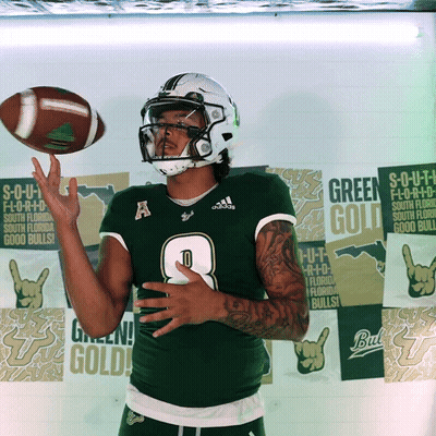 Football Player Number 8 Throws Ball GIF