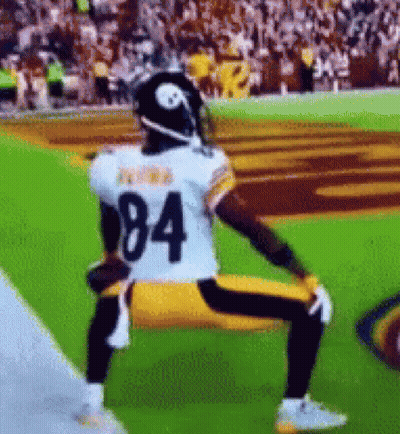 Football Player Number 84 Kneeling On Field GIF
