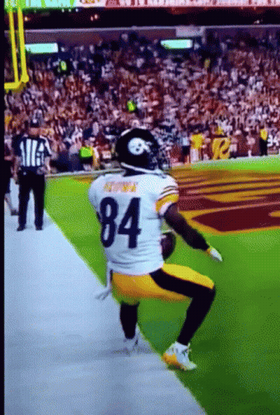 Football Player Number 84 Kneeling On Field GIF