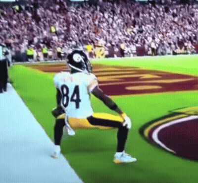 Football Player Number 84 Kneeling On Field GIF