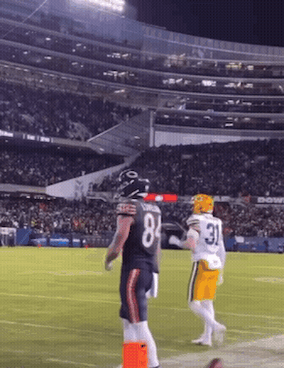 Football Player Number 84 Standing On Field GIF