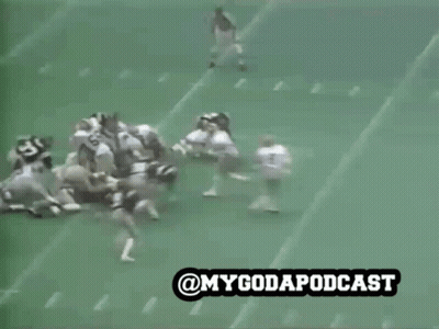 Football Player Number 88 Surrounded By Players GIF