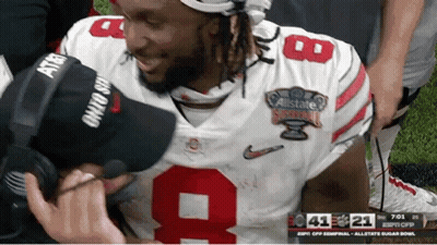 Football Player Number 9 Being Interviewed GIF
