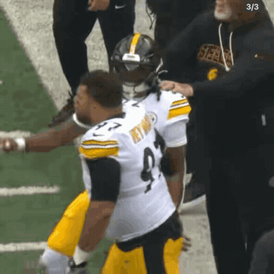 Football Player Number 9 Helped Off Field GIF
