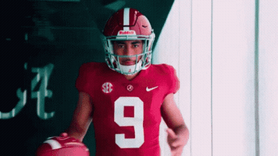 Football Player Number 9 Holding Football GIF