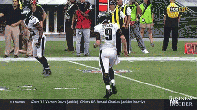 Football Player Number 9 Kicking Ball GIF