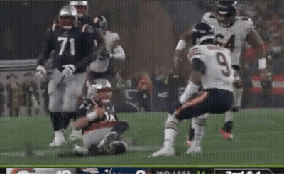 Football Player Number 9 Kneeling Down GIF