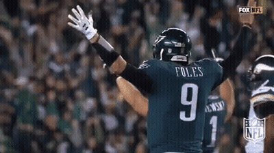 Football Player Number 9 Raising Arms GIF