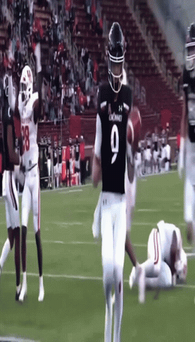 Football Player Number 9 Running On Field GIF