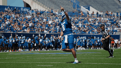 Football Player Number 9 Standing On Field GIF