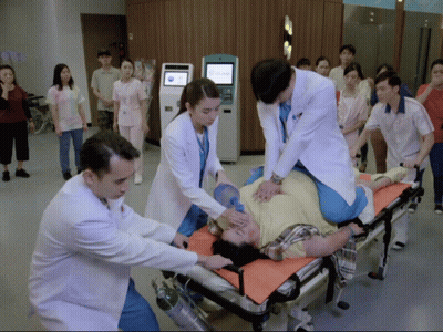 Football Player Number 9 Talking To Another GIF