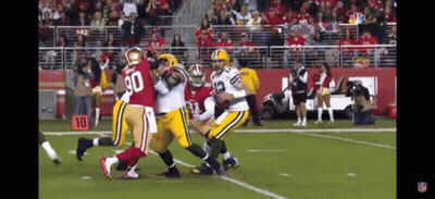 Football Player Number 90 Being Tackled GIF