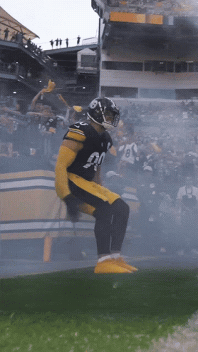 Football Player Number 90 Jumping GIF