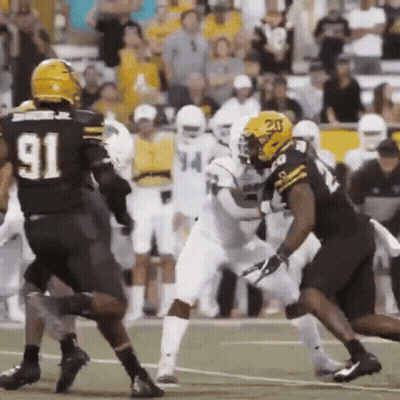 Football Player Number 91 Being Tackled GIF