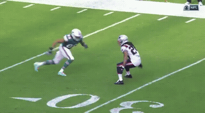 Football Player Number 94 Running On Field GIF