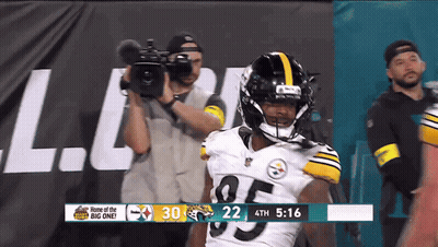 Football Player Number 95 In Front Of Camera GIF