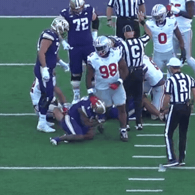 Football Player Number 98 Being Tackled GIF