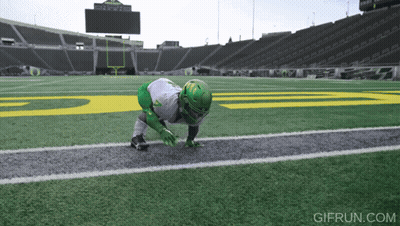 Football Player On Field With Gifrun Logo GIF
