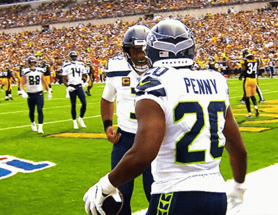 Football Player Penny On Back GIF