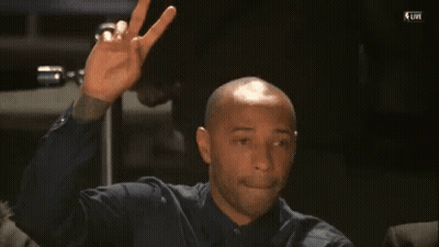 Football Player Red Banner Saying Touchdown GIF