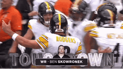 Football Player Rodgers Surrounded By Players GIF
